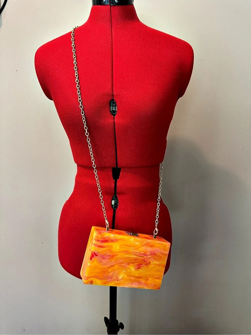 Marbled Acrylic Chain Clutch in Yellow & Pink